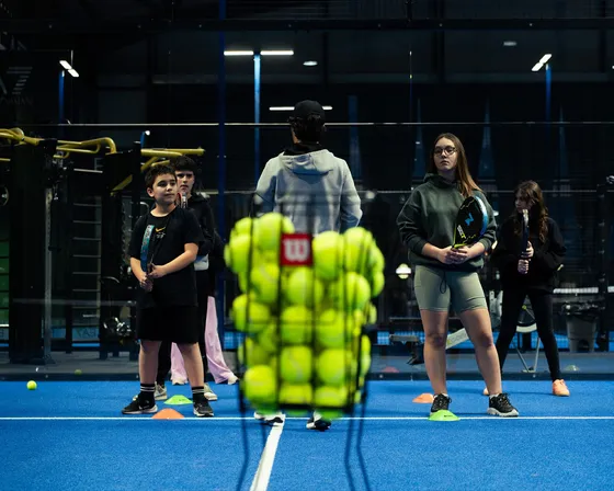 Kids training at the junior padel academy